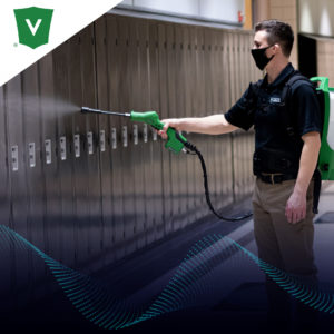 Technician disinfecting lockers with a Victory Backpack Electrostatic Sprayer